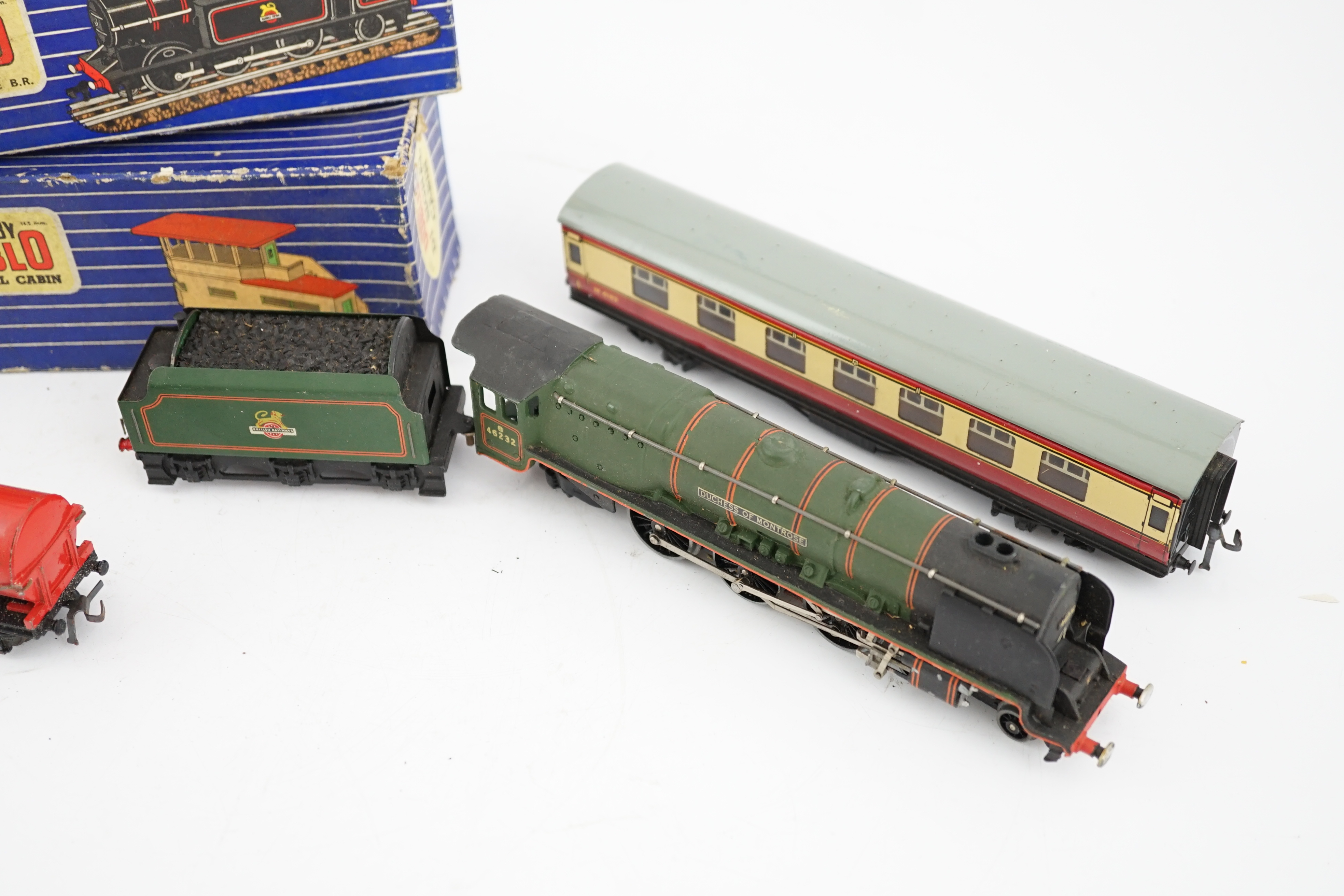 A collection of Hornby Dublo for 3-rail running, including two BR locomotives; a Duchess of Montrose and a Class N2 0-6-2T, together with two tinplate bogie coaches, wagons, signal box, signals, and a small quantity of t